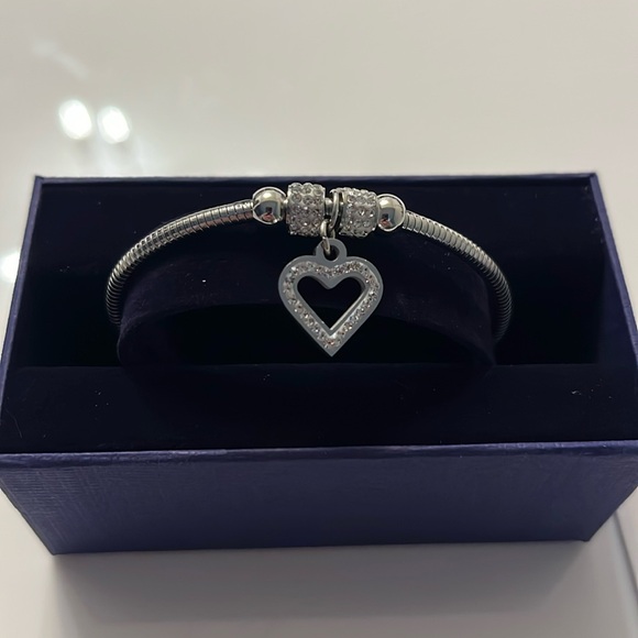 Swarovski Jewelry - SWAROVSKI heart charm bangle surround by pave crystals
